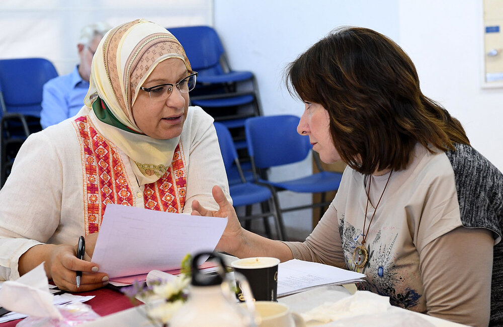 Two workers negotiating