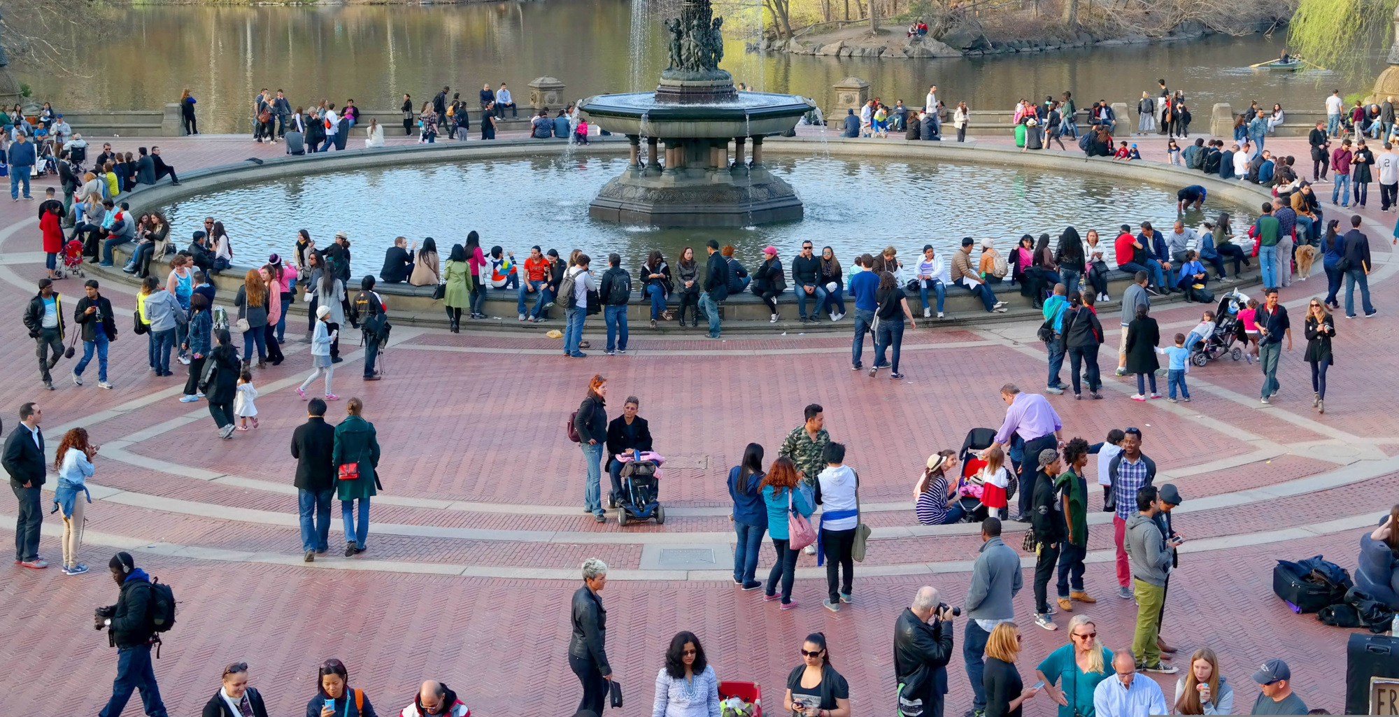 public park with water fountain and people