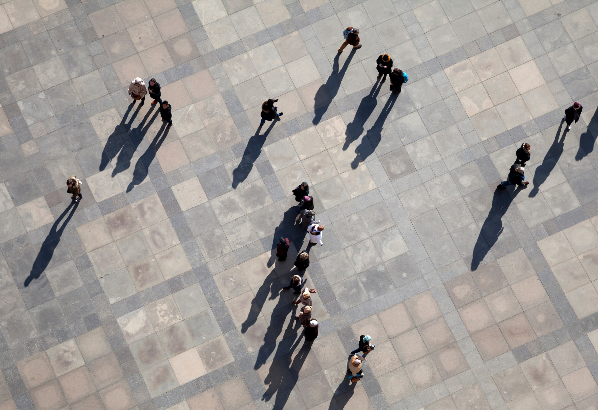 Over head view of people walking in a city